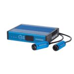 Racelogic VBOX Motorsport data logger with blue and black casing and connected sensors for racing analysis.