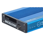 Racelogic VBOX M+ GPS data logger for motorsport and automotive testing, compact blue device with multiple ports and indicator lights.