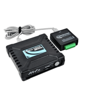 Racelogic Video VBOX device with connecting cables, used for automotive data logging and analysis.