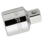 Close-up of a Facom 1/2 to 3/8 coupler S.230, chrome-plated with a hexagonal shape and a screw for secure connection.