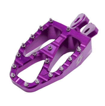 Purple racing footpeg for motorcycle with metal studs, designed for Grand Prix racewear.
