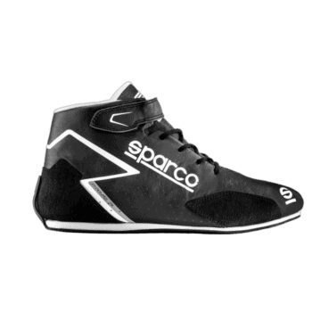 Black Sparco racing shoe with white accents and Velcro strap, designed for motorsport safety and performance.