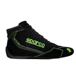 Black Sparco racing shoe with neon green accents and branding, designed for motorsport safety and performance.