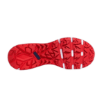 Red racing shoe sole with aggressive tread pattern for grip and performance in motorsport.