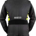 Close-up of a black and yellow Grand Prix Racewear racing suit with Sparco logo, designed for motorsport safety and performance.
