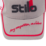 Close-up of a grey and red Grand Prix Racewear cap with 'stilo' logo and slogan 'Any competition, one helmet'.