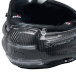 Stilo carbon fibre motorcycle helmet with aerodynamic design and clear visor, suitable for racing and high-performance riding.