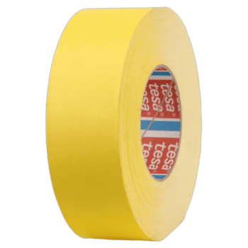 Yellow racing tape roll used for motorsport track marking and safety at Grand Prix events.