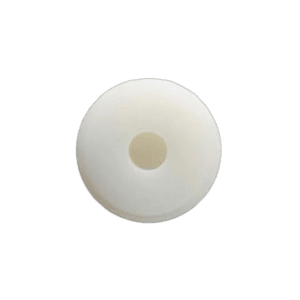 Close-up of a white circular object with a beige centre, used in racing gear or equipment.