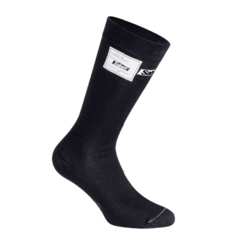 Black racing sock with white label, designed for motorsport safety and comfort, ideal for racewear enthusiasts.