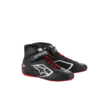 Black and red Alpinestars racing shoes designed for motorsport enthusiasts and professional drivers.