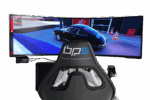 A detailed racing simulator setup featuring a curved monitor, a high-performance racing seat, and a realistic driving environment for immersive motorsport experiences.