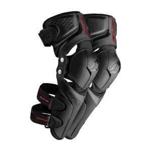 Protective motorcycle knee and shin guards with adjustable straps, designed for racing and track riding, offering maximum safety and comfort for motorsport enthusiasts.