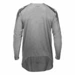 Fly Racing Evolution 2026 DST Jersey in grey with black accents, designed for motocross riders, featuring breathable fabric and ergonomic fit.