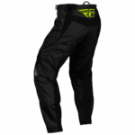 Fly Racing F-16 2024 Junior motocross bottoms in black with neon green logo, designed for young riders' motocross racing.