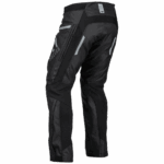 Black and grey FLY Racing Patrol Over-Boot Trousers designed for motocross and off-road riding, featuring reinforced panels and reflective details.
