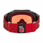 Red Oakley Airbrake MX goggles with black and white detailing and a peace sign logo on the strap.