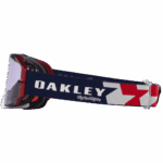 Oakley Airbrake MX Troy Lee Designs goggles with a red, white, and blue strap featuring the Oakley logo and Troy Lee Designs branding.