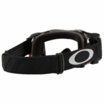 Oakley MX goggle with black strap and tinted lens for motocross racing.