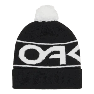 Oakley Factory Cuff Beanie in black and white with pom-pom, featuring bold Oakley logo, ideal for motorsport fans and winter wear.