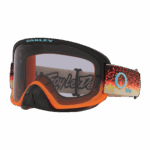 Grand Prix Racewear motocross goggles with black, orange, and grey frame, featuring a colourful strap and tinted lens for optimal eye protection.