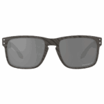 Oakley Sylas Moto GP sunglasses with a dark wood-effect frame and grey tinted lenses, designed for racing and outdoor activities.