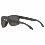 Oakley Sylas Moto GP sunglasses with carbon fibre frame and grey lenses, designed for motorcycle riders and racing enthusiasts.