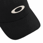 Black Grand Prix Racewear cap with white Oakley logo, designed for motorsport enthusiasts and racers. Perfect for racing events, casual wear, and motorsport branding. High-quality, stylish headgear.