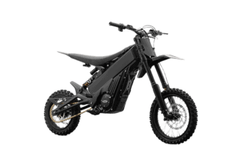 Electric dirt bike for kids with black frame, knobby tires, and front suspension, suitable for young riders and outdoor adventures.