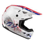 Grand Prix Racewear FLY Racing Kinetic Drip Junior Helmet in red, white, and blue with splash design, suitable for young motocross riders.