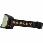 Oakley MX goggles with reflective lens and black strap featuring gold 'OAKLEY' logo, designed for motocross racing.