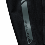 Close-up of Troy Lee Designs SCOUT GP PRO Mono Bottoms showing durable black fabric and reflective branding details.