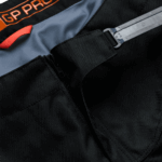 Close-up of Troy Lee Designs SCOUT GP PRO Mono Bottoms showing durable fabric and detailed stitching for motocross racing.