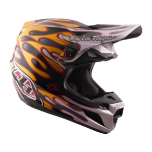 Troy Lee Designs SE5 Carbon Overspray helmet with flame graphics in black, yellow, and pink, featuring the Troy Lee Designs logo.