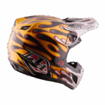 Troy Lee Designs SE5 Carbon Overspray Helmet with flame graphics in yellow, black, and pink for motocross racing.